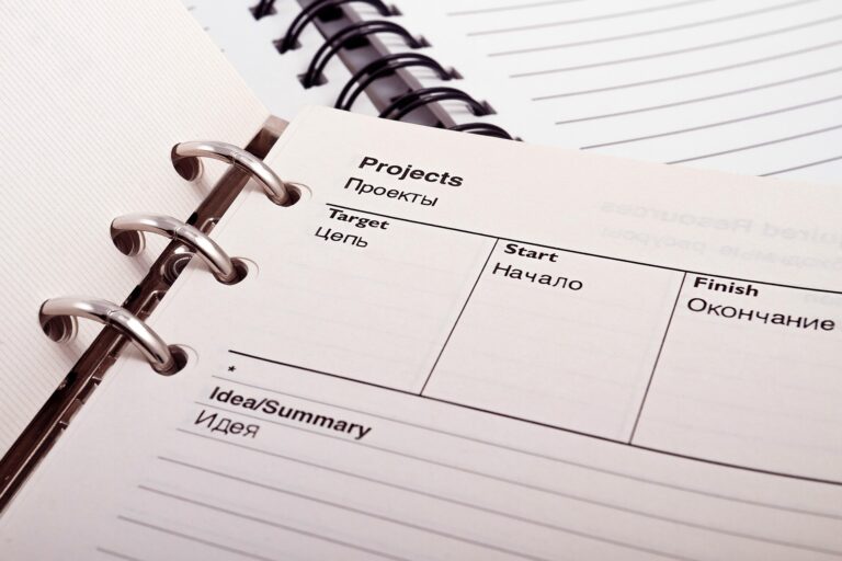 weekly planning for solo work using a notebook and calendar